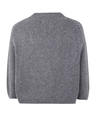 Khaite Long-sleeved Knitted Sweater In Gray