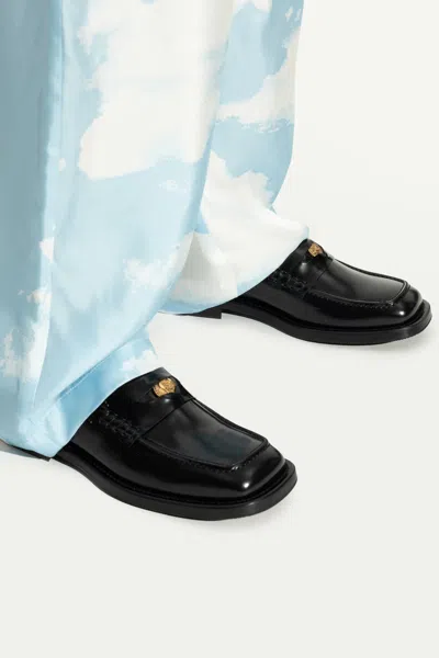 Moschino Leather Loafers In Black