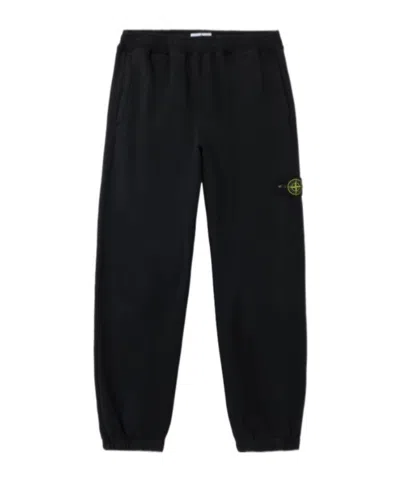 Stone Island Loose-fit Joggers With Pockets And Elasticateed Cuffs In Black