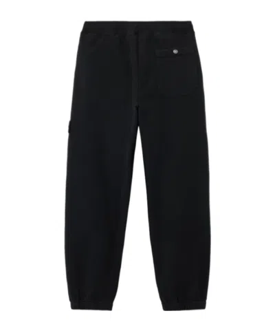 Stone Island Loose-fit Joggers With Pockets And Elasticateed Cuffs In Black
