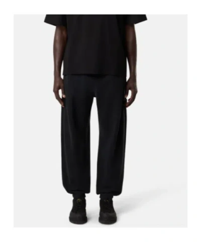 Stone Island Loose-fit Joggers With Pockets And Elasticateed Cuffs In Black