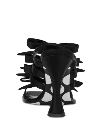 Moschino Bow Detail Curved Heel Mules In Black