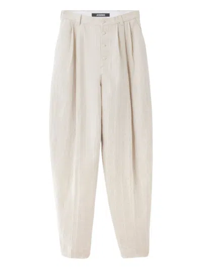 Jacquemus Le Fernando Button-front Pleated Trousers In Neutral