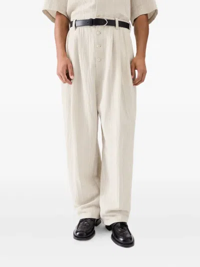 Jacquemus Le Fernando Button-front Pleated Trousers In Neutral