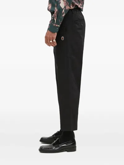 A Bathing Ape Logo-appliqué Trousers In Black