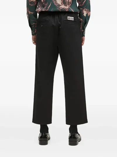 A Bathing Ape Logo-appliqué Trousers In Black