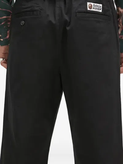 A Bathing Ape Logo-appliqué Trousers In Black