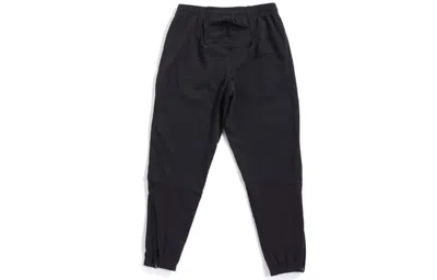 Nike Solo Swoosh Straight-leg Logo-embroidered Cotton-blend Jersey Sweatpants In Black