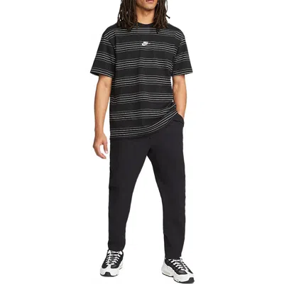 Nike Men's  Sportswearcommuter Elastic Waistband Woven Solid Color Sports Pants Black