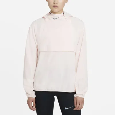 Nike (wmns) As W Nk Df Rn Dvn Po Pckbl Jkt Pale Coral In Pink