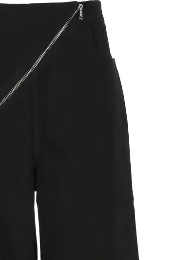 Alaïa Womens Noir Alaia Spiral Two-patch-pockets Wide-leg High-rise Denim-blend Trousers In Black
