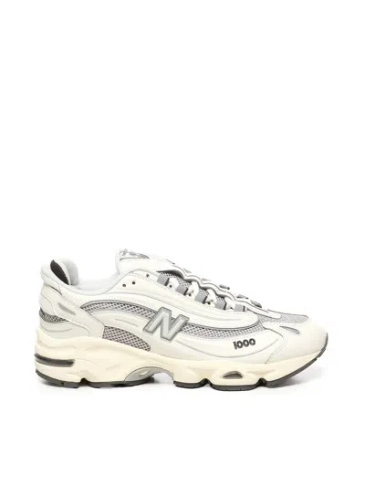 New Balance Grey Low Top Sneakers With Logo Patch On Side And Tongue And Perforated Panels In White