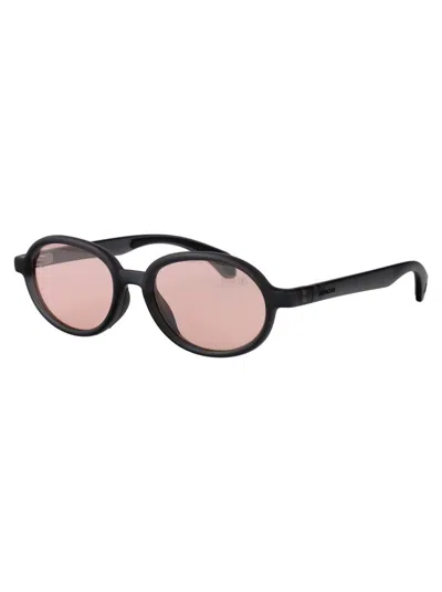 Moncler Matte Transparent Grey Injectate Sunglasses In Black