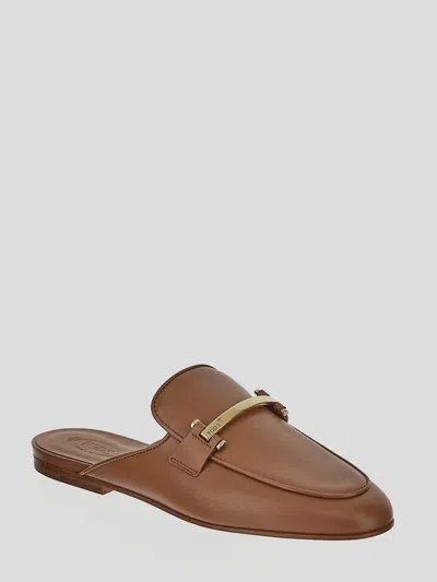 Tod's Flat Leather Mules In Brown