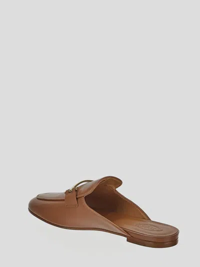 Tod's Flat Leather Mules In Brown