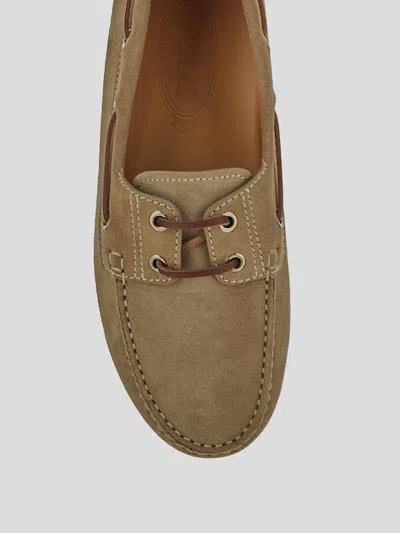 Tod's Gommino Leather-trimmed Suede Loafers In Brown