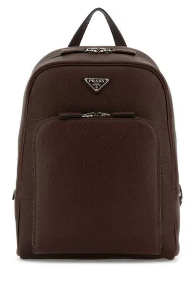 Prada Leather Backpack With Top Handle And Front Zip Pocket In Brown