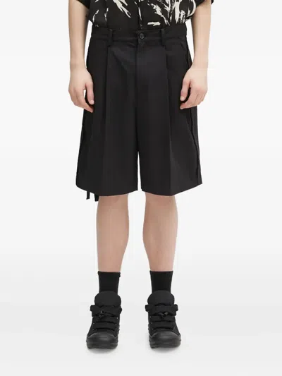 Undercover Pleated Shorts In Black