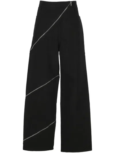 Alaïa Womens Noir Alaia Spiral Two-patch-pockets Wide-leg High-rise Denim-blend Trousers In Black