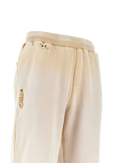 Cole Buxton Distressed Cuffed Joggers In Neutral