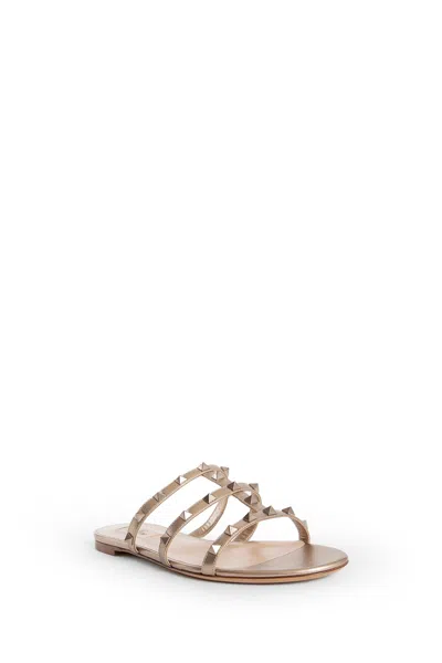Valentino Woman Gold Sandals & Slides In Silver