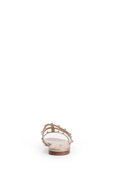 Valentino Woman Gold Sandals & Slides In Silver