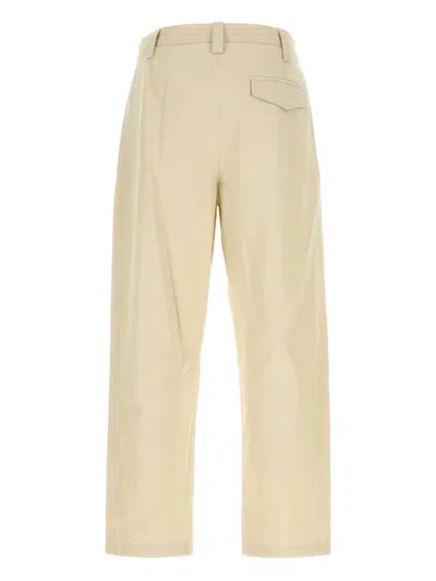 Apc Renato Tapered Pleated Herringbone Cotton Trousers In Neutral