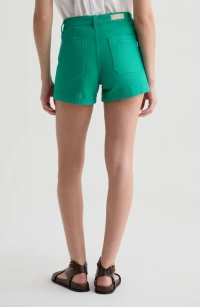 Ag Daisy Patch Pocket Denim Shorts In Green