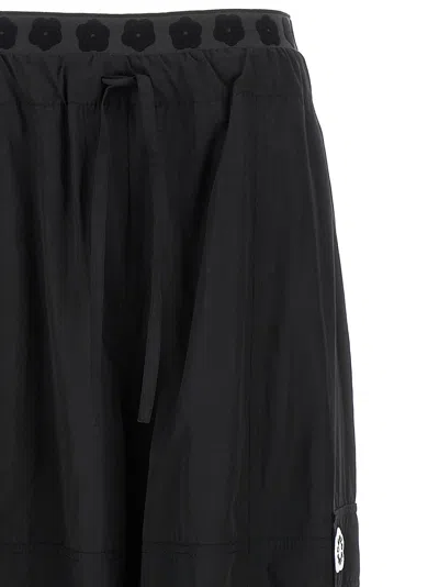 Kenzo 'boke Flower 2.0' Black Pants With Flowers Embellishmed Waist And Logo Patch On The Pocket In Black
