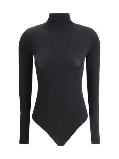 Wolford Seamless Fitted Turtleneck Long-sleeved Top In Black