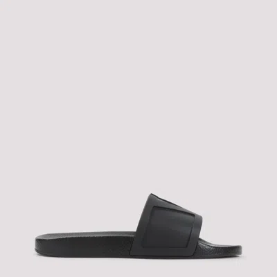 Valentino Garavani Minimalist Black Slides With Geometric Detail