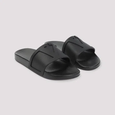 Valentino Garavani Minimalist Black Slides With Geometric Detail