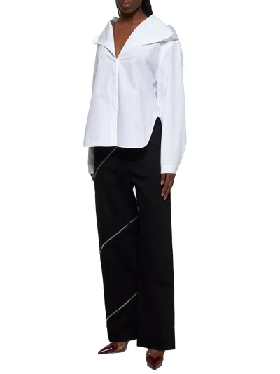 Alaïa Womens Noir Alaia Spiral Two-patch-pockets Wide-leg High-rise Denim-blend Trousers In Black