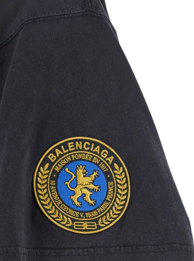 Balenciaga Black Crewneck T-shirt With Logo Lettering On The Front And Logo Patch On The Sleeve In Cotton Man
