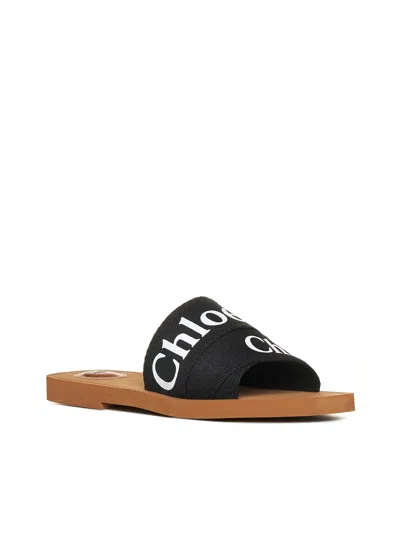 Chloé Woody Flat Logo Ribbon Slide Sandals In Black