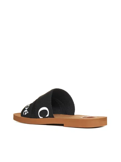 Chloé Woody Flat Logo Ribbon Slide Sandals In Black