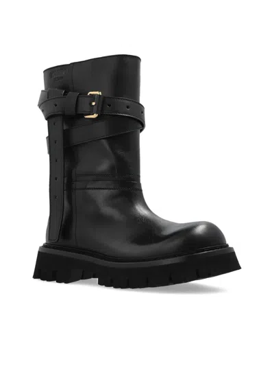 Moschino Buckle-strap Boots In Black