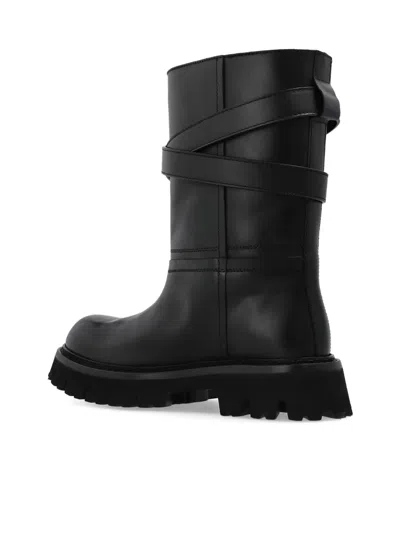 Moschino Buckle-strap Boots In Black