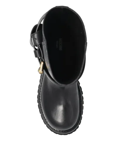 Moschino Buckle-strap Boots In Black