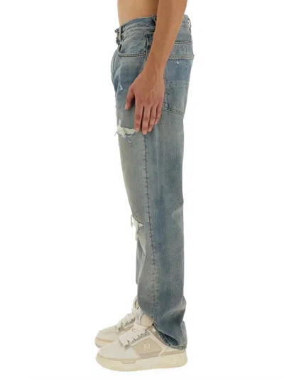 Amiri Straight Leg Mid-rise Distressed Trousers In Gray