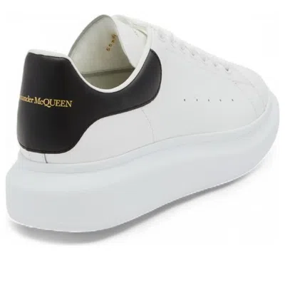 Alexander Mcqueen Men White And Black Low-top Sneakers With Chunky Sole And Contrasting Heel Tab In