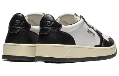 Autry Medalist Low Sneakers In Calf Leather With Perforated Toe In Black