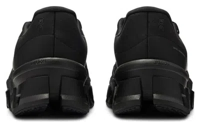 On Cloudmster Void Sneakers In Black