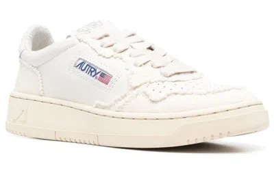 Autry Low-top Sneakers With Minimalist Design And Elevated Sole In White