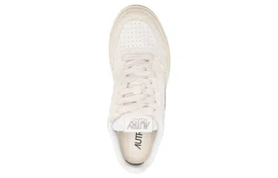 Autry Low-top Sneakers With Minimalist Design And Elevated Sole In White