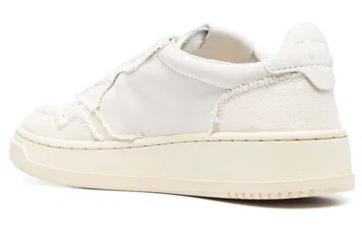 Autry Low-top Sneakers With Minimalist Design And Elevated Sole In White