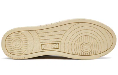 Autry Low-top Sneakers With Minimalist Design And Elevated Sole In White