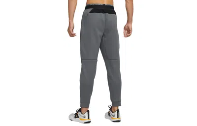 Nike Men's  Np Tf Turf Thrma Sphr Fleece Lined Stay Warm Sports Knit Bundle Feet Long Pants/trousers  In Gray