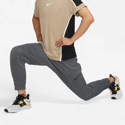 Nike Men's  Np Tf Turf Thrma Sphr Fleece Lined Stay Warm Sports Knit Bundle Feet Long Pants/trousers  In Gray