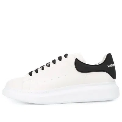 Alexander Mcqueen White And Black Low-top Sneakers With Chunky Sole And Contrasting Heel Tab In Leather Man In White